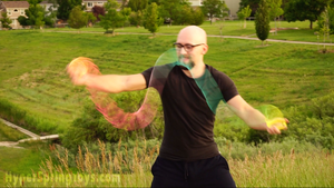 Slinky Josh manipulating a HyperSpring outdoors on a beautiful evening in Colorado